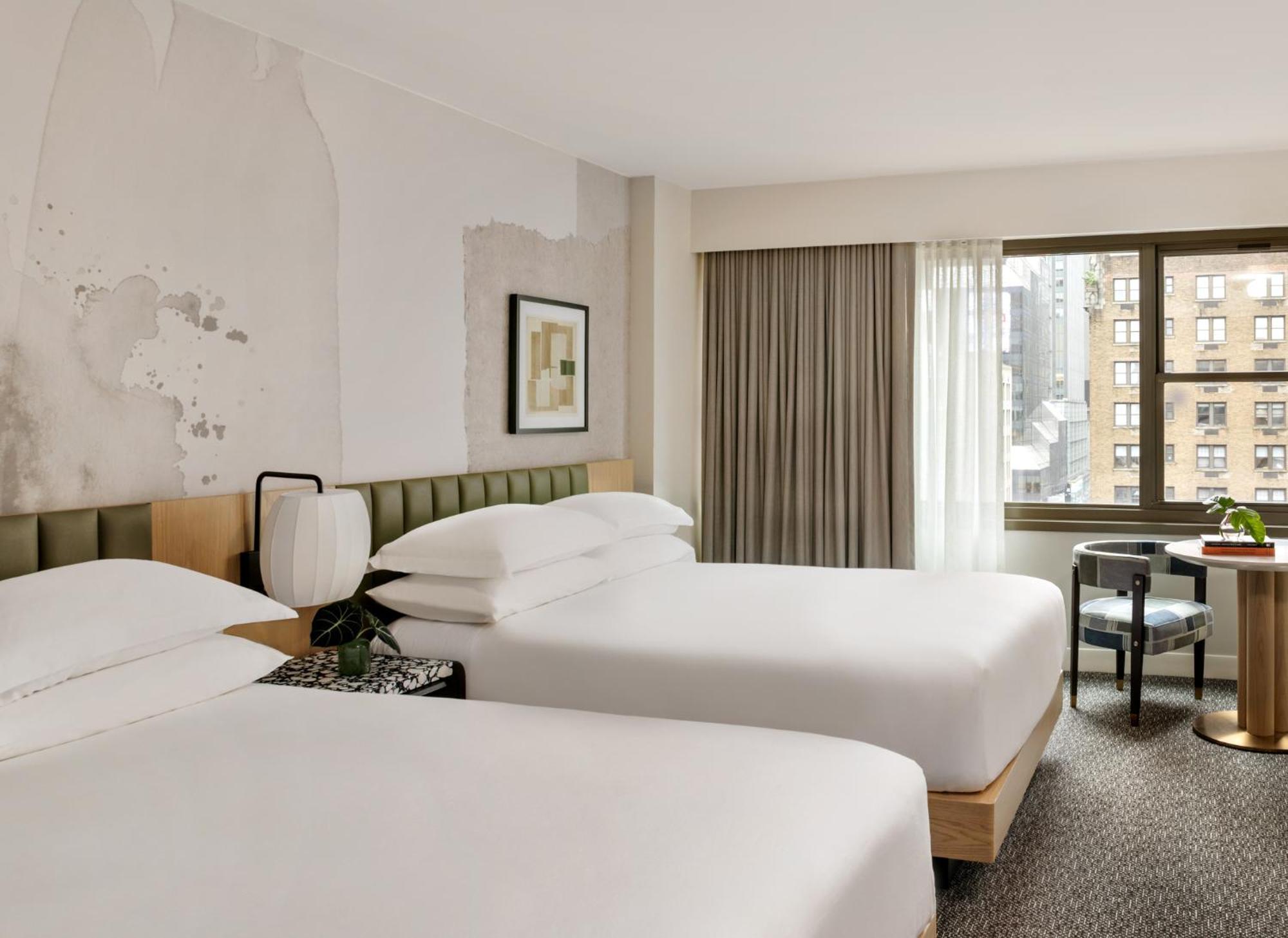 Kimpton Theta New York - Times Square By Ihg Hotel ภายนอก รูปภาพ A guest room at the hotel
