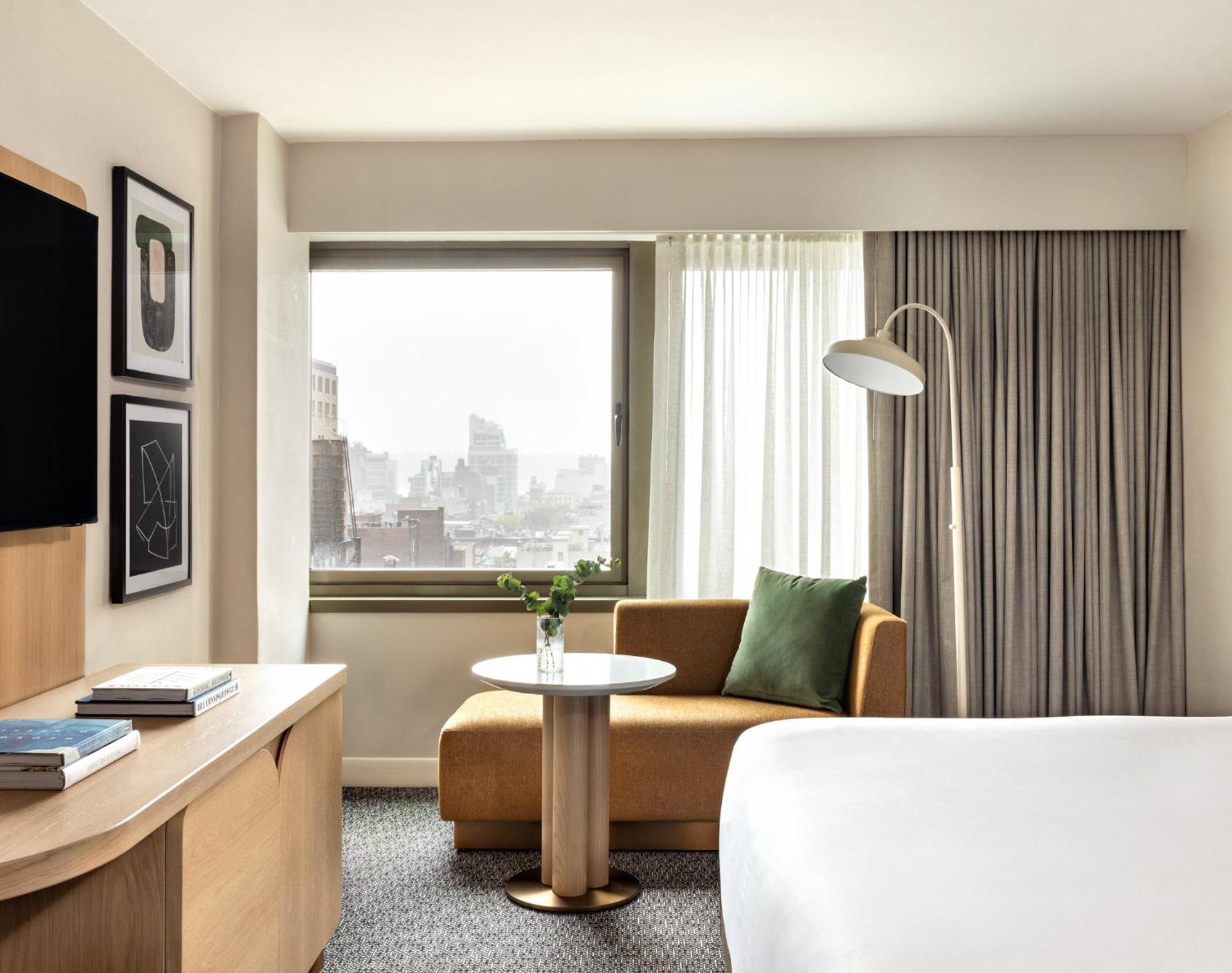 Kimpton Theta New York - Times Square By Ihg Hotel ภายนอก รูปภาพ A guest room at the Hotel Commonwealth